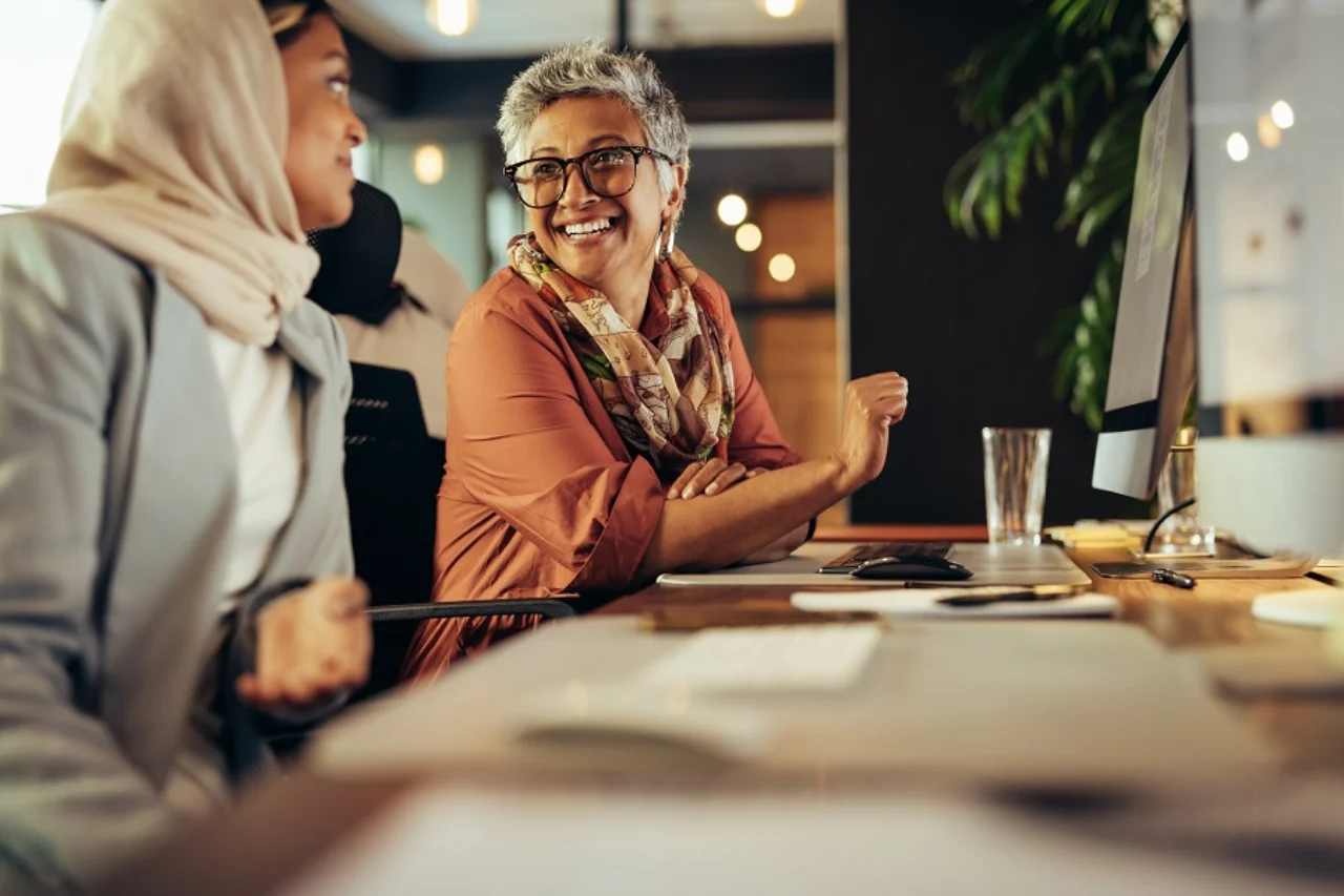 Two female employees in discussions