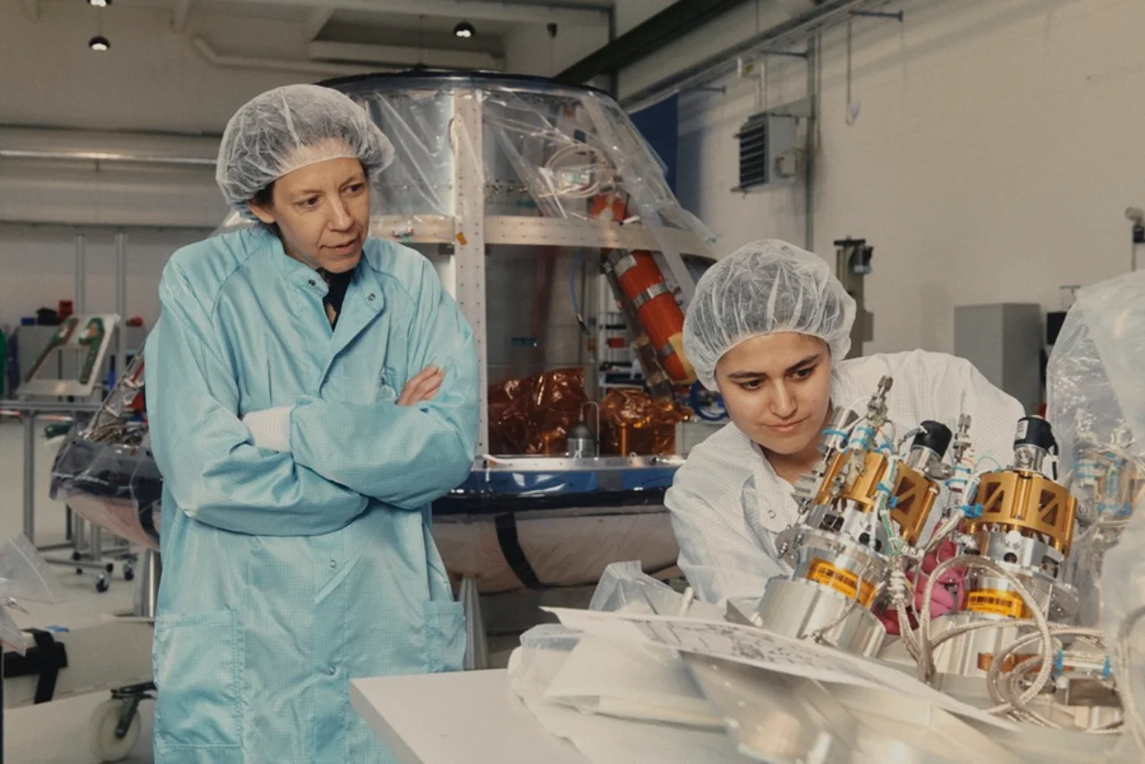 Helene Huby of The Exploration Company supervises a technician.