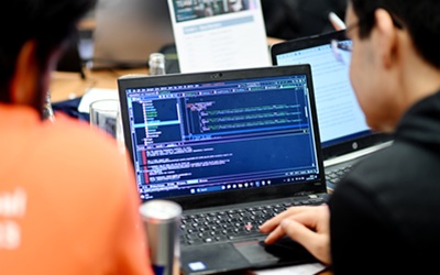Developer-reviewing-code
